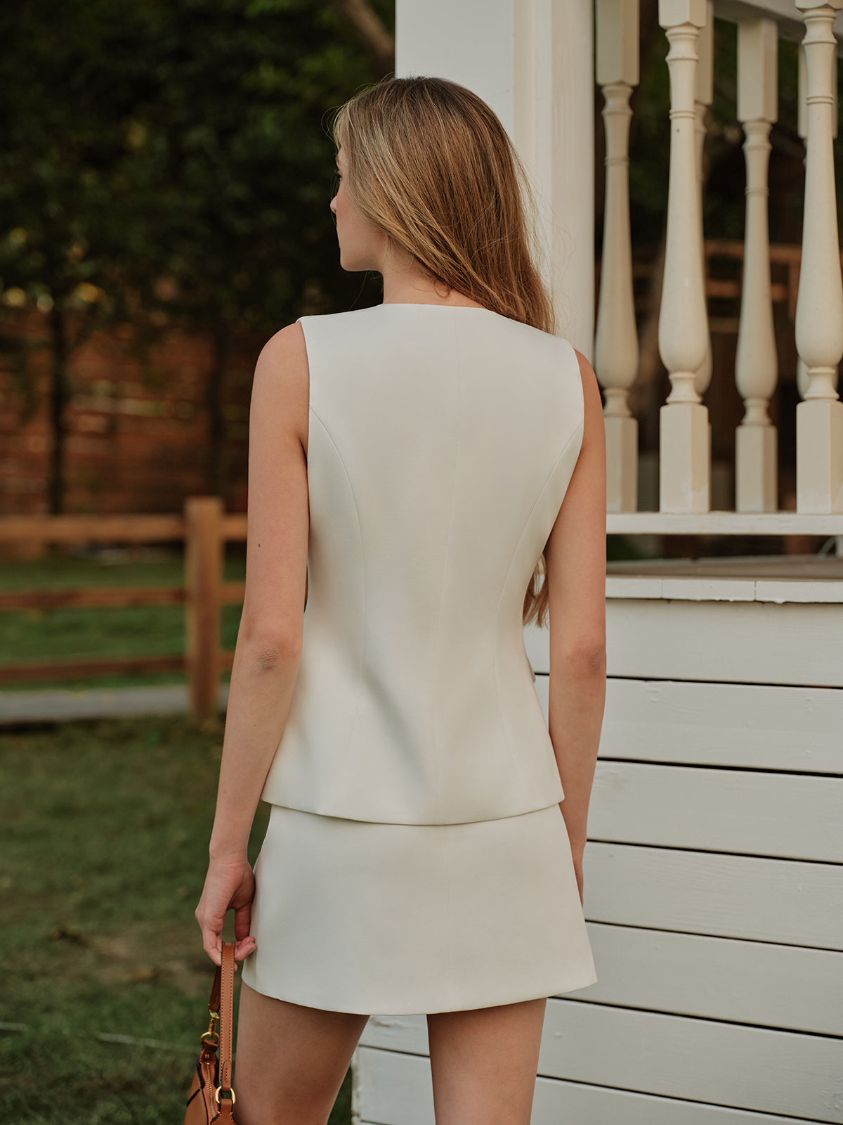 Elegant Metal Button Split Vest and Skirt Set